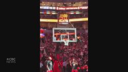 #TheMoment a Raptors fan nailed an almost impossible half-court shot News Clip