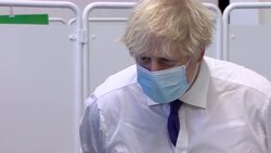 Boris Johnson chats to a lady during his visit to Bristol covid-19 vaccination centre News Clip