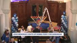 Families kick off Hanukkah by helping build 12-foot Lego menorah Instructional Video