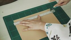 Woman artist is cutting paper Stock Footage