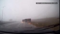 Semi-truck flips from high winds in U.S. News Clip