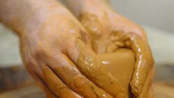 Potter makes a jug Stock Footage