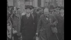 Profile of retiring PM Winston Churchill meeting with military officials, walking through cheering crowds, observing London bomb damage News Clip