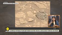 NASA scientists spot strange rocks on Mars News Clip