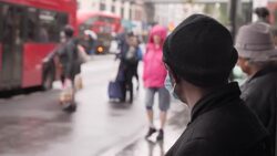 London bus stop with signs advising of social distancing measures News Clip