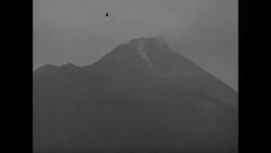Refugees from Merapi eruption; lava flowing; rice rations News Clip