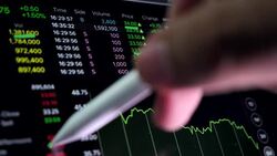 Financial analyzing see charts and graphs on the screen of Tablet PC Stock Footage