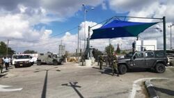 VOICED : Israeli troops on guard after killing of Palestinian News Clip