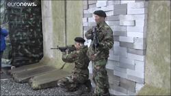 Raw Moment: Protesters dressed as soldiers create 'Brexit border wall' on island of Ireland News Clip