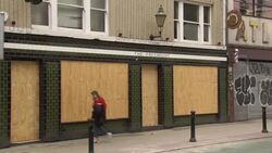 Closed, deserted Manchester shopping street News Clip