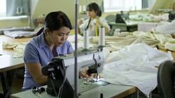 Asian Woman Working with Sewing Machine Stock Footage