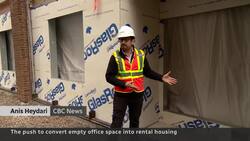 Cities work to transform empty office buildings into residential space News Clip
