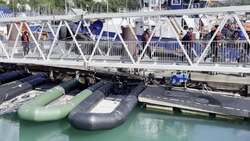 Migrants brought to shore in Dover after incident in the Channel. News Clip