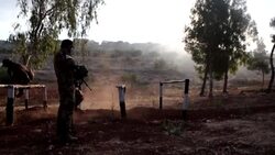 CLEAN : Fighters from Syria's Hayat Tahrir al-Sham take part in graduation exercise News Clip