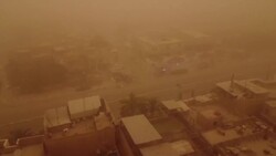 CLEAN : AERIAL IMAGES: Southern Iraqi city blanketed by thick sheet of orange during sandstorm News Clip
