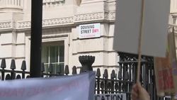 Campaigners walk with 20,000-signature petition to Downing Street during the demonstration over funding crisis in education for young people with special educational needs and disabilities News Clip