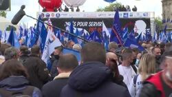 CLEAN : Thousands of police rally outside France's National Assembly after officer's murder News Clip