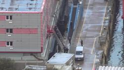 A body appears to be removed from the Bibby Stockholm News Clip