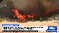 Hundreds of firefighters battle a major wildfire raging out of control on fringes of Greek capital News Clip