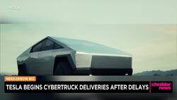 Biz Roundup: Fed Chair Talks Rates, Cybertrucks Delivered, Apple & Paramount Talk Streaming Deal News Clip