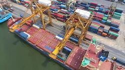 Flying Over Industrial Port with Containers Ship, Bangkok, Thailand, Aerial video Stock Footage