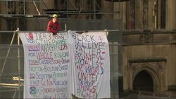 Anti-lockdown protester unfolds banner on Big Ben News Clip
