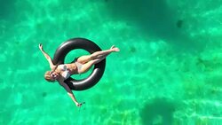Relaxation in a swimming pool Stock Footage