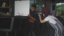 Young woman taking photo with slr camera Stock Footage