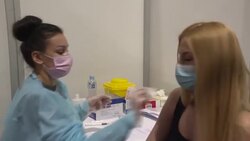 CLEAN : 'Vaccine tourists' flock to Serbia for free Covid-19 jab News Clip
