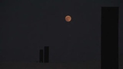 CLEAN : Sunset and the full moon rising time-lapse on Serra's installation in Qatar News Clip