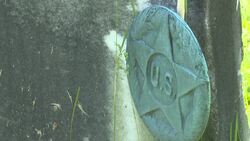Paying tribute: Westport Boy Scouts place flags at the graves of veterans News Clip