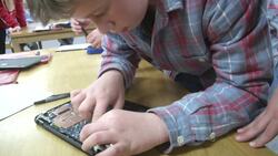 Student 'geek squads' maintain school devices News Clip