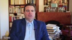 Now a wanted man, Lebanon’s central bank head steps down News Clip