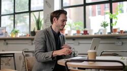 Freelance businessman working in a cafe Stock Footage