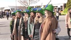 Women posing for photo at Cheltenham Festival on St Patrick's Day News Clip