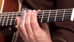 How to Play with a Bottleneck Slide in Country Guitar Instructional Video