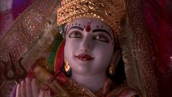 CLOSE ANGLE OF FACE OF STATUE OF HINDU GOD. RELIGIOUS. Stock Footage