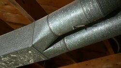 Panning across a air conditioning HVAC ventilation air shaft - duct work - V1 Stock Footage