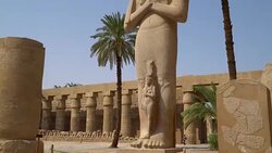 Karnak Temple in Luxor, Egypt. The Karnak Temple Complex, commonly known as Karnak, comprises a vast mix of decayed temples, chapels, pylons, and other buildings in Egypt. Stock Footage
