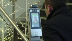 Staff using a face scanner to enter the Amex Stadium News Clip