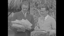 Elliott Roosevelt looks through mail News Clip