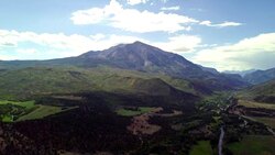 Aerial View of Mt. Sopris near Aspen Colorado in the Fall Stock Footage