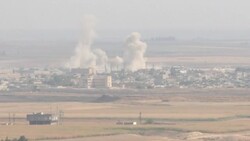 CLEAN : Smoke rises from the Syrian city of Ras al-Ain on Turkish border News Clip
