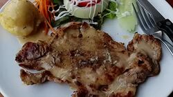 Slow motion of Meat steak (Beef or Pork steak) Stock Footage