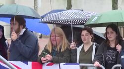CLEAN : Despite the rain, Royal's enthusiasts wait for Prince and Princess of Wales, William and Kate News Clip