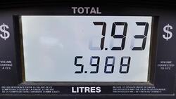 Big screen of rising gas prices on pump screen Stock Footage