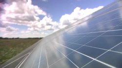 Solar panels at a solar farm News Clip
