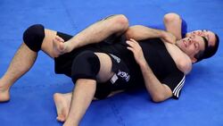 How to Escape Back Attacks in MMA Fighting Instructional Video