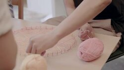 Man doing art and craft project, assembling string art in office Stock Footage