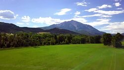 Aerial View of Mt. Sopris near Aspen Colorado in the Fall Stock Footage